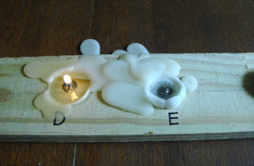 12 paraffin votive out